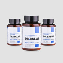 Drei braune Flaschen Dr. Balwi Shop Biotin & Keratin Tabletten, jede mit einem weiß-blauen Etikett und 60 Tabletten, sind vor einem schlichten hellgrauen Hintergrund abgebildet.