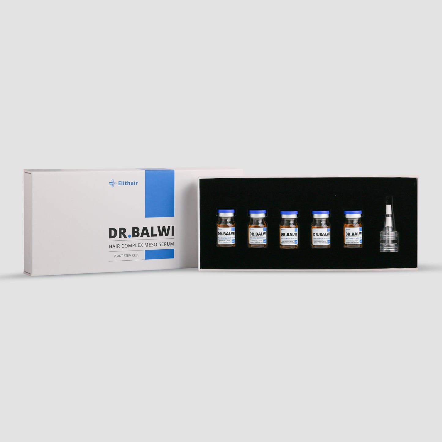In der geöffneten Schachtel Dr. Balwi Meso Therapie von Dr. Balwi Shop befinden sich fünf Fläschchen und eine Tropfflasche aus schwarzem Schaum, die das Haarwachstum anregen und Haarausfall vorbeugen sollen.